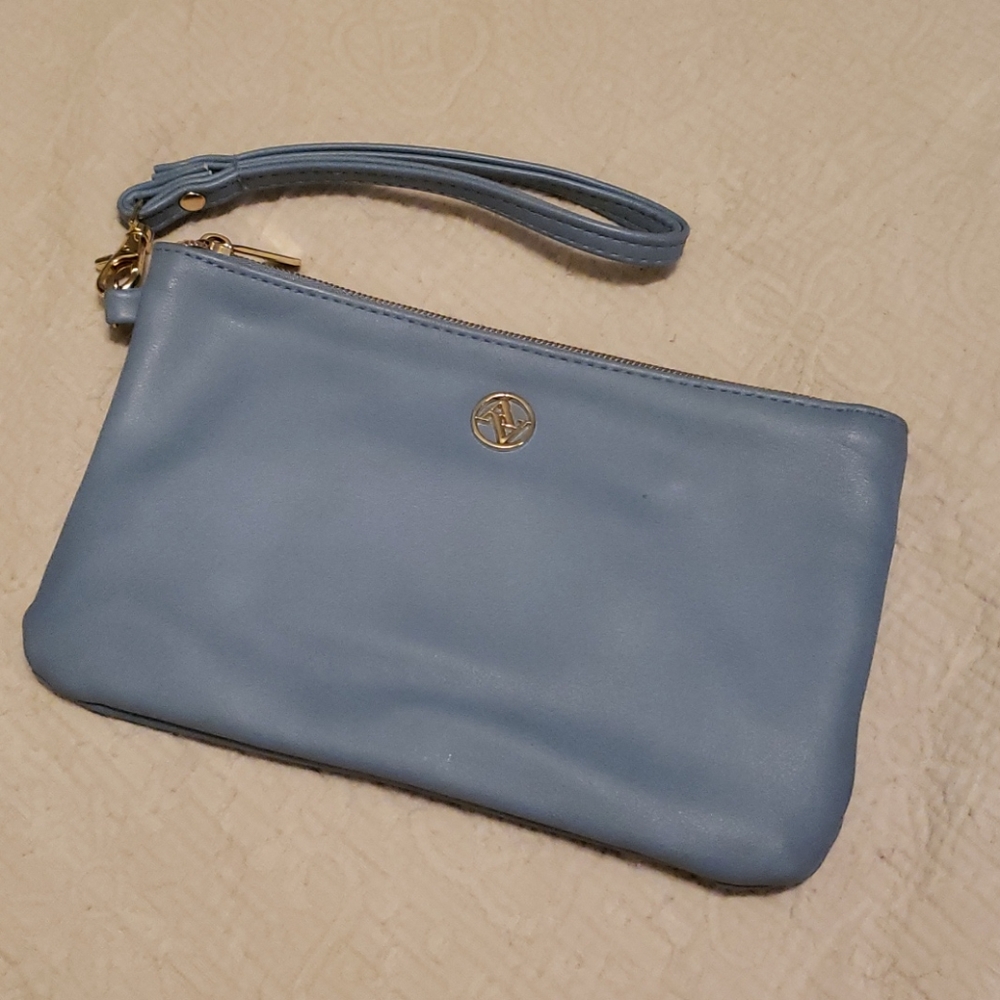 NWOT baby blue wristlet w/ built in battery pack